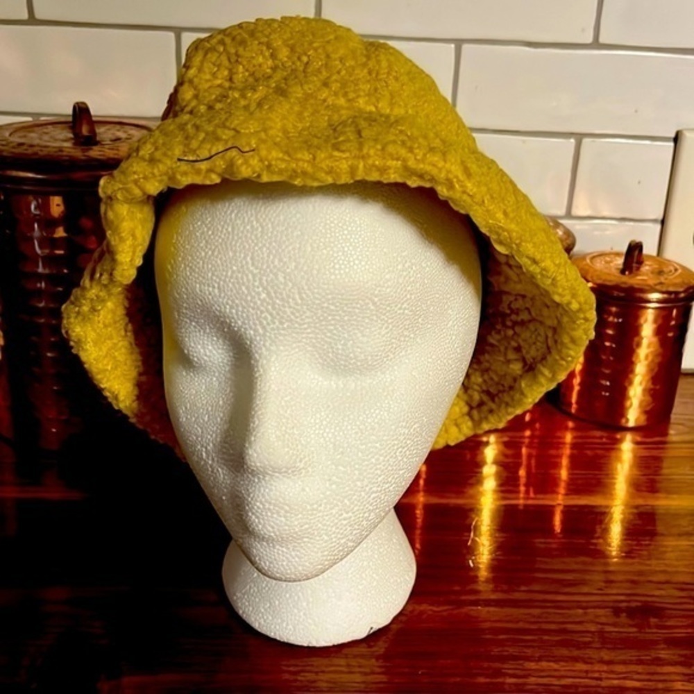 Fuzzy ladies bucket hat. Adjustable strap inside. New approx 22 inches around